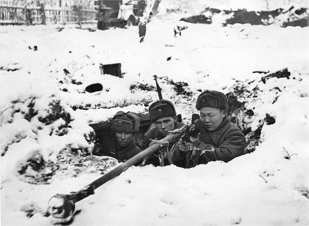 Soviet infantry counterattacking through snow outside Moscow, winter 1941